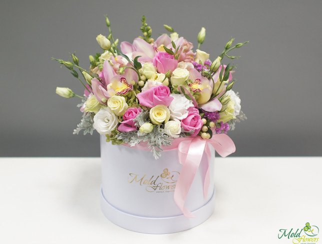 Box with roses, eustoma, roses, orchids, alstromeria, eucalyptus photo