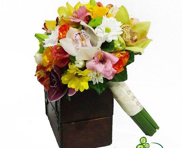 Bride's bouquet of Phalaenopsis orchids, alstroemerias, roses, and chrysanthemums - Photo
