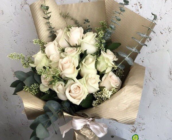 Bouquet of Beige Roses and Eucalyptus in Golden Paper Photo