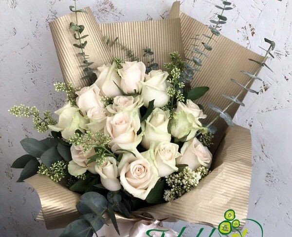 Bouquet of Beige Roses and Eucalyptus in Golden Paper Photo
