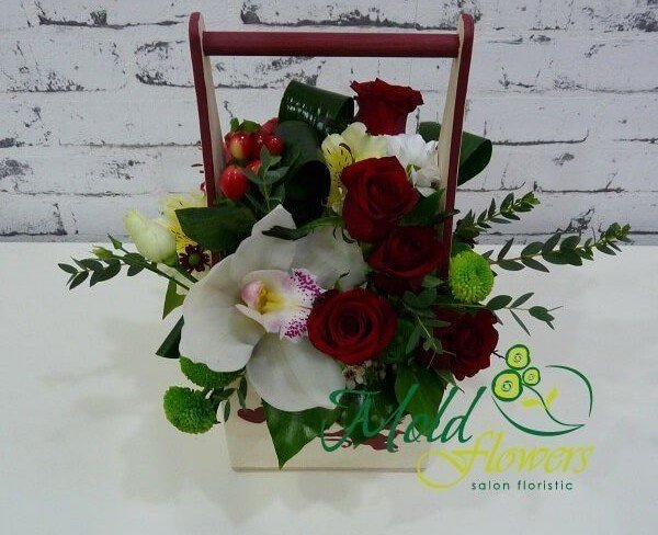 Box of red roses, white orchid, green chrysanthemums, yellow alstromeria and red hypericum photo