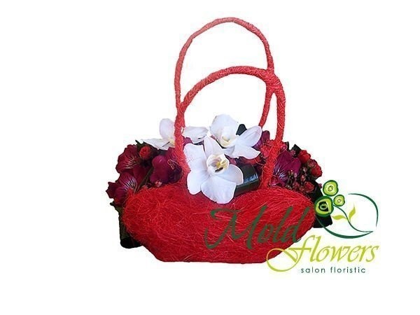 Red handbag with white orchids and red alstromerias photo