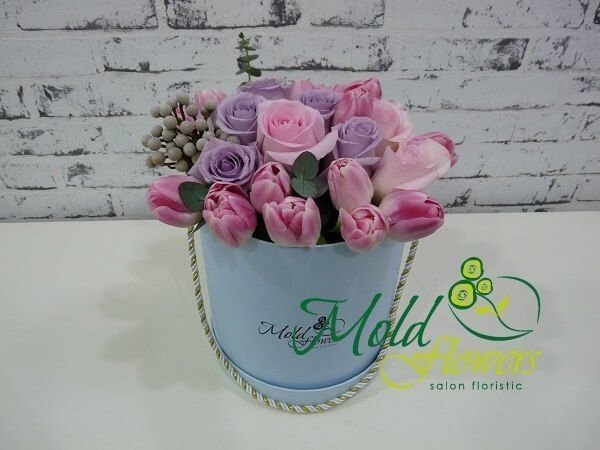 Blue box with pink and purple roses, pink tulips, eucalyptus and brunia photo