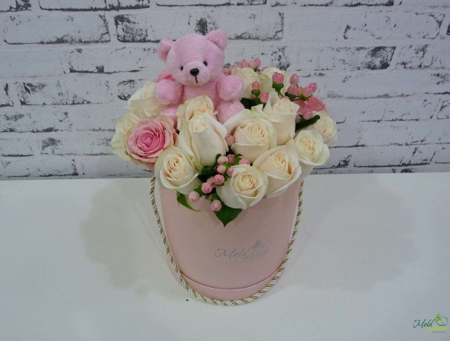 Pink box with white and pink roses, pink hypericum and pink teddy bear photo