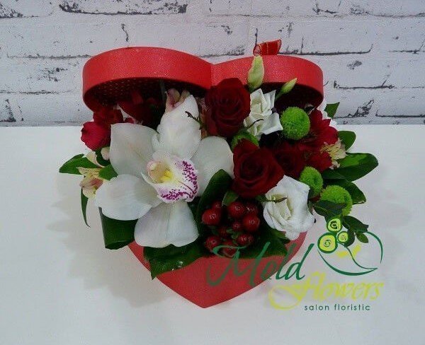 Red heart box with red and white roses, white orchid, red hypericum, yellow alstromeria, chrysanthemums photo