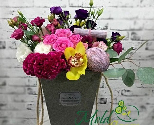 Gray box with cymbidium orchid, carnation, eustoma, roses photo