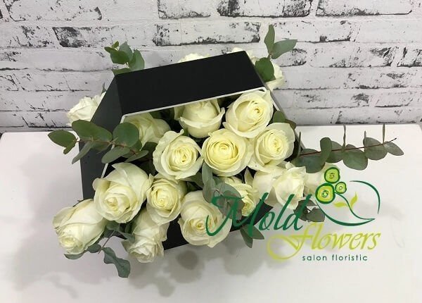 Black box with white roses and eucalyptus photo