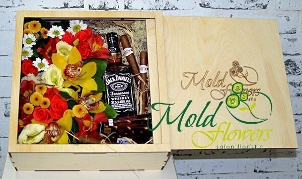 Wooden box with orange roses, yellow orchid, white chrysanthemum, red alstromeria, Jack Daniels whiskey and cigars photo