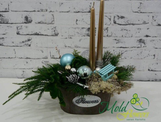 Composition with golden candles, cones, blue sleigh, Christmas toys, spruce branches photo
