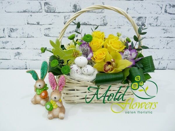 Basket with roses, cymbidium orchid, alstromeria, chrysanthemums, decor photo