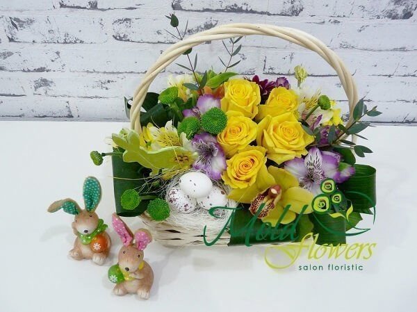Basket with roses, cymbidium orchid, alstromeria, chrysanthemums, decor photo