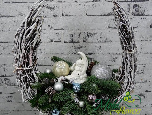 Composition with sprigs of spruce, Christmas toys, cones, decorative angel photo