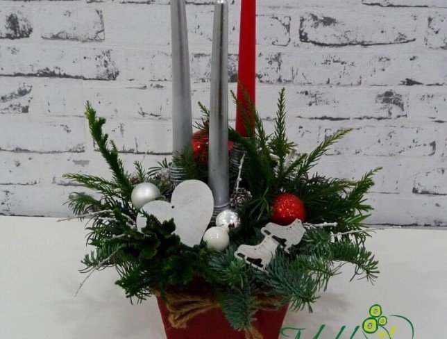 Composition with sprigs of spruce, red and silver candles, Christmas toys, cones photo