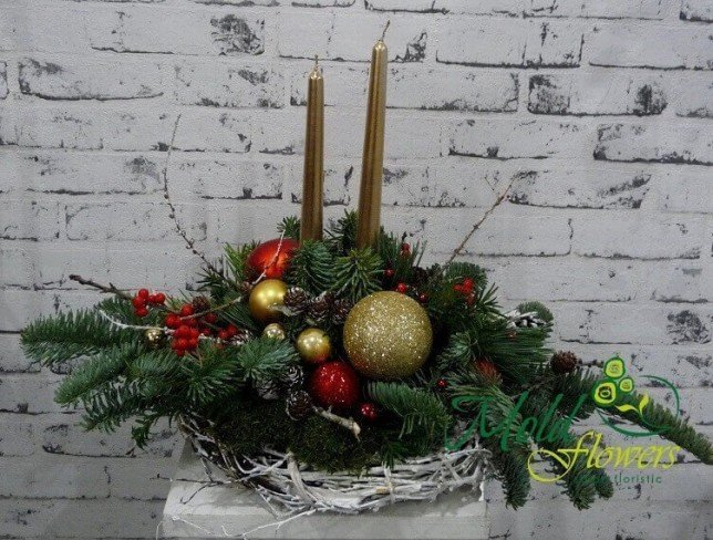 Composition with golden candles, cones, red rowanberries, Christmas toys, sprigs of fir trees photo