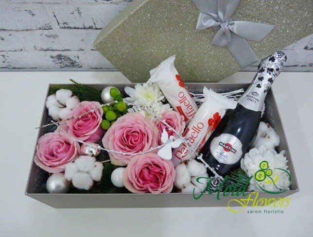 Box with roses, chrysanthemums, cotton, hypericum, Raffaello, Martini bottle, New Year decor photo