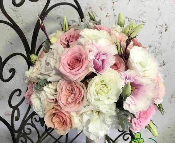 Bouquet of pink and peach roses, pink and white eustoma, boutonniere of peach roses and pink eustoma photo