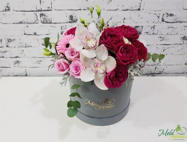 Box with pink roses, peony roses, gerberas, chrysanthemums, white orchids, eustomas photo