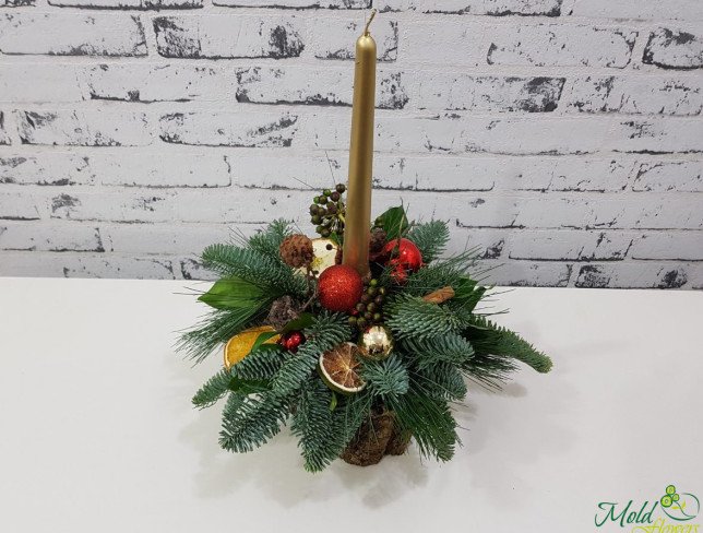 Composition with sprigs of spruce, golden candle, Christmas toys, decorative dried fruits photo