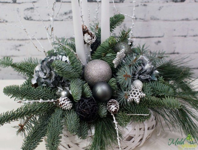 Composition with white candles, sprigs of spruce, cones, Christmas toys, decorative stars photo