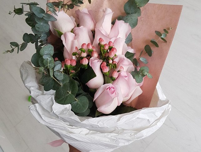 Bouquet of pink roses, hypericum, eucalyptus photo