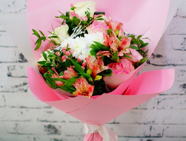 Bouquet of pink alstromeria, hypericum, white and pink roses, white chrysanthemums photo