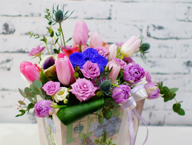 Box of roses, vanda orchid, calla lilies, tulips, alstromeria, eucalyptus photo
