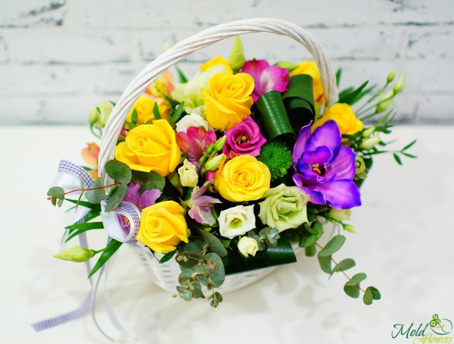 Basket of yellow roses, white and pink eustoma, purple orchid, pink and purple alstroemeria, eucalyptus photo