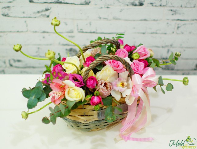 Basket of pink and white roses, pink eustoma, alstroemeria, bush roses, white orchid, cappuccino tulips, eucalyptus photo
