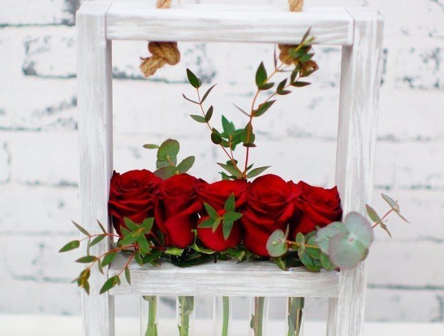 Wooden Frame with Red Roses photo
