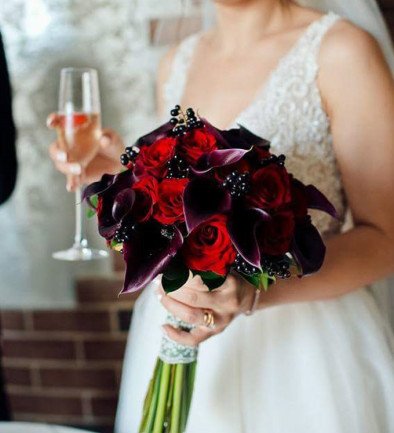 Bridal Bouquet with Black Calla Lilies and Red Roses photo 394x433