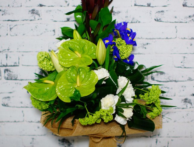 Bouquet of anthurium, mini hydrangea, carnations, lilies, irises, leucadendron, ruscus, chick photo
