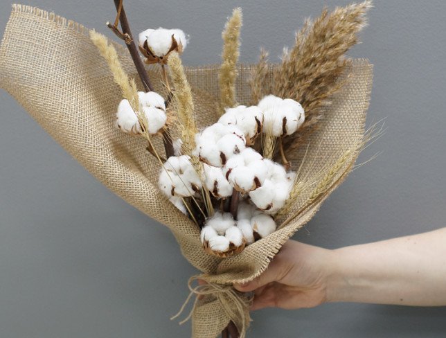 Bouquet of cotton in burlap photo