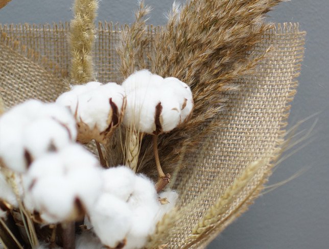 Bouquet of cotton in burlap photo