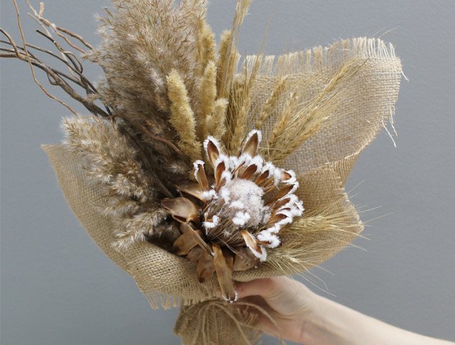 Bouquet of dried flowers in burlap photo