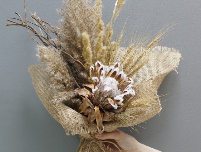 Bouquet of dried flowers in burlap photo