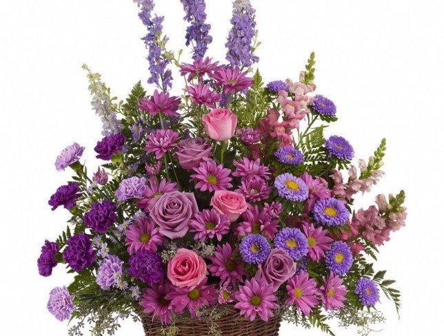 Basket with violet flowers (not available) photo
