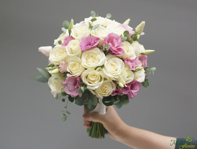 Bride's bouquet of white roses, pink eustoma, and eucalyptus from moldflowers.md