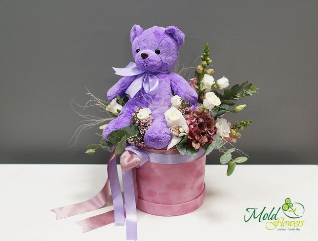 Box with flowers and teddy bear plush photo