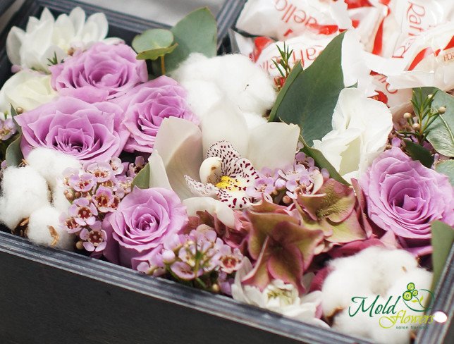 Composition of chrysanthemums, roses, cotton flowers, alstroemeria, eucalyptus, and wax flowers with a wooden heart filled with Raffaello from moldflowers.md