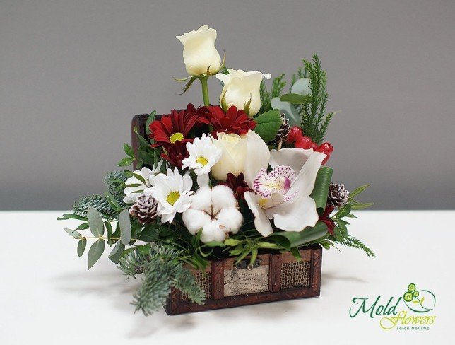 Chest with white rose, chrysanthemum, pinecones, spruce branches and orchid photo