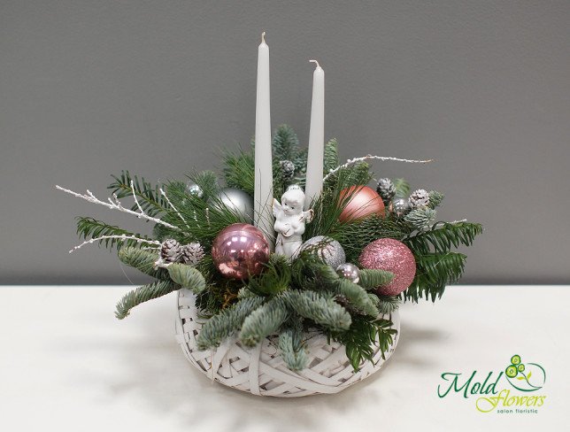 Composition with Christmas toys, white angel, candles, cones, spruce branches photo