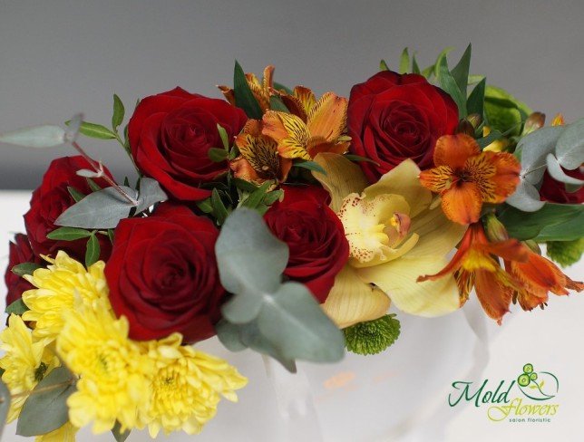 White heart box with red roses, yellow orchid, alstromeria, mimosa and eucalyptus photo