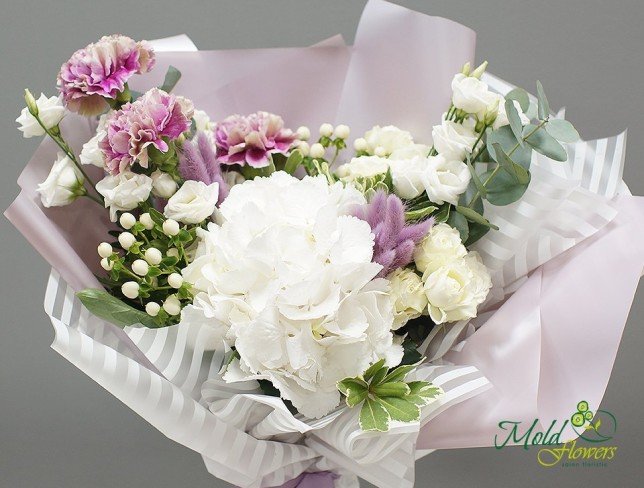 Bouquet with white hydrangea, lisianthus, and roses photo