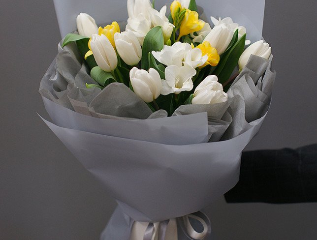 Bouquet of white tulips and freesias photo