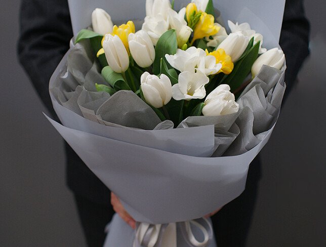 Bouquet of white Dutch tulips and freesias
