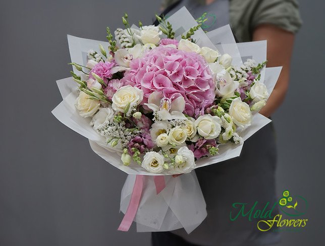 Bouquet with pink hydrangea, white roses, and orchid photo