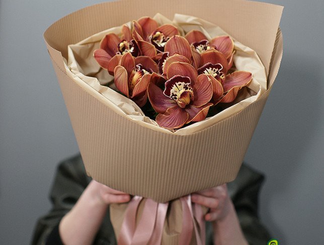 Bouquet of brown orchids photo