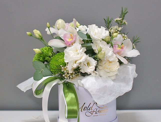 Box with green chrysanthemum, white orchid and eustoma photo