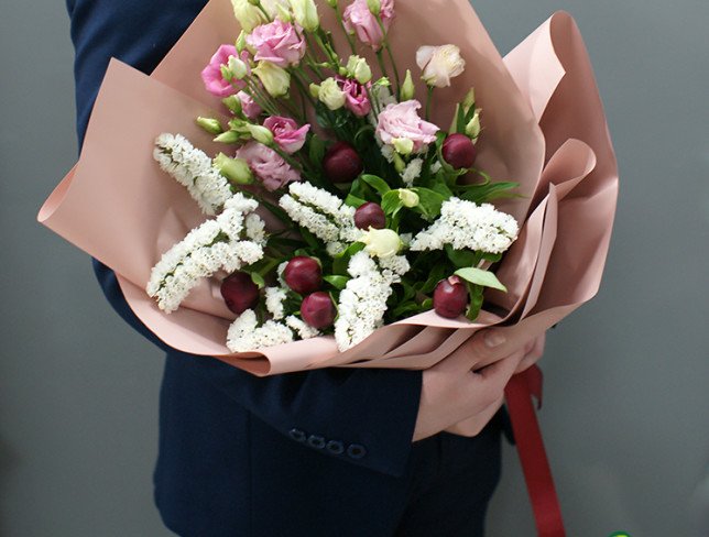 Bouquet of pink eustomas and burgundy peonies photo
