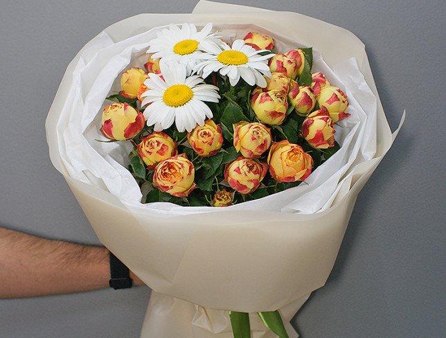 Bouquet of peony roses and daisies photo